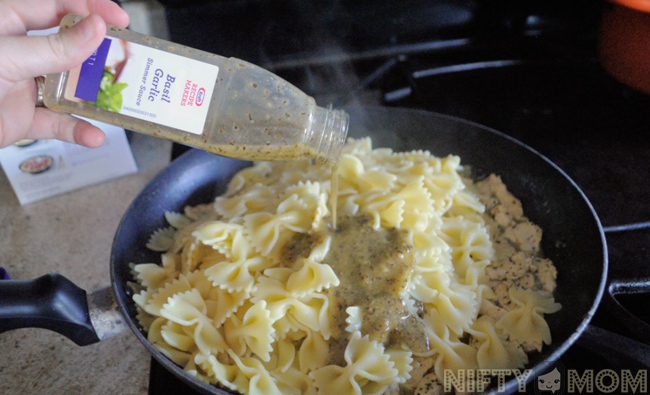 Mixing Ingredients for Chicken Bruschetta Pasta