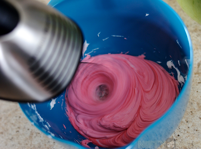 Hand Mixer with Whisk to Mix Color into Frosting