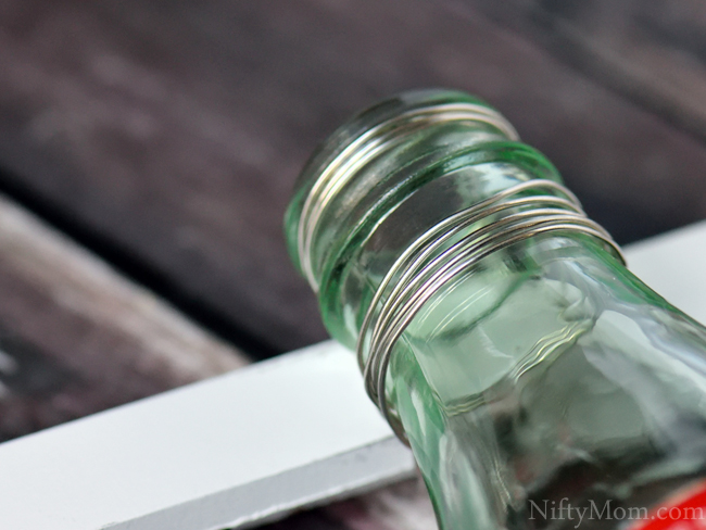 How to Hang a Coke Bottle on a Picture Frame with Wire