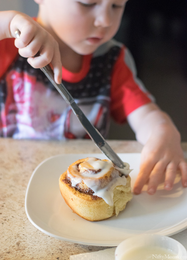 Weekend breakfast means the kids ice their own cinnamon rolls