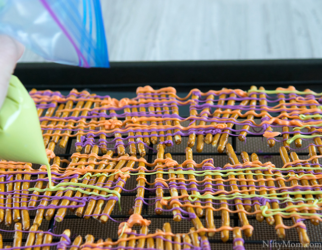 Candy Melts Drizzled over Pretzels