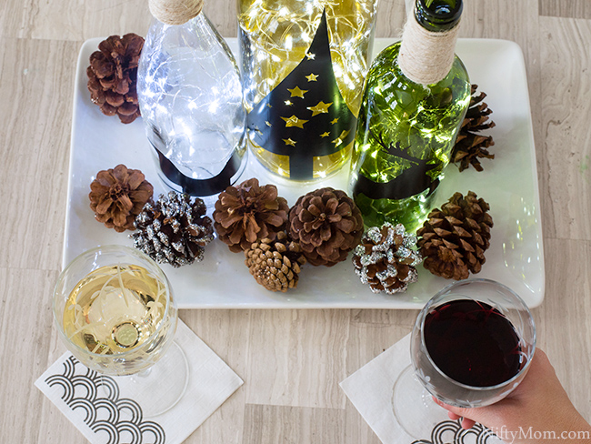 DIY Lighted Wine Bottle Holiday Decor & Centerpiece