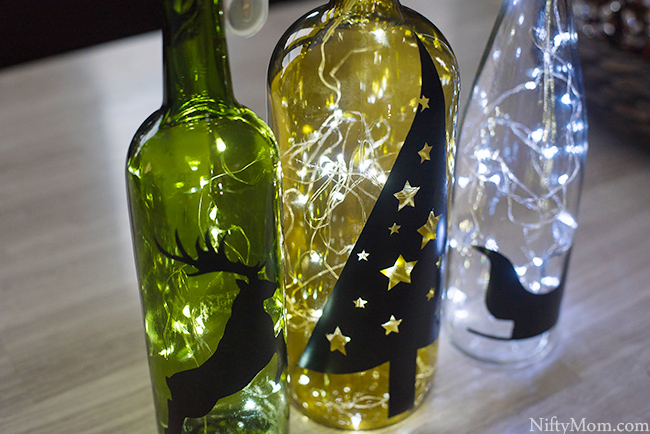 DIY Lighted Wine Bottle Holiday Decor & Centerpiece