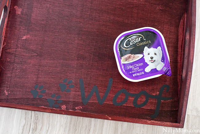 Turn a basic wooden tray into a custom dog food tray! Plus download the free file for the vinyl cutouts